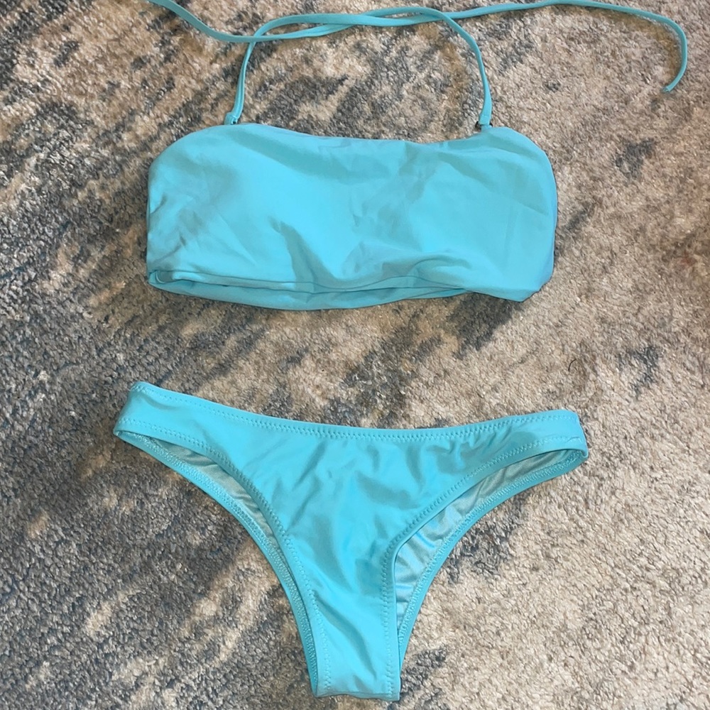 Size small women’s aqua blue bikini.
